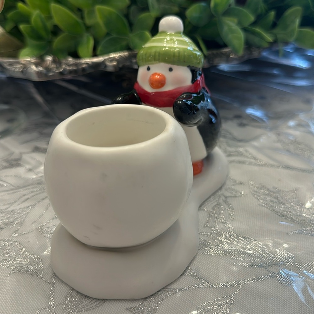 Hallmark tea light Christmas candle holder, penguin, warming his hands.